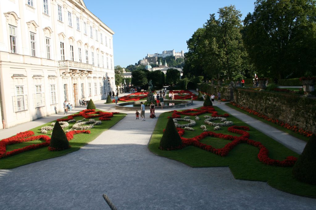 The peaceful morning at Mirabell Gardens, with Hohensalzburg Fortress standing majestically in the distance.