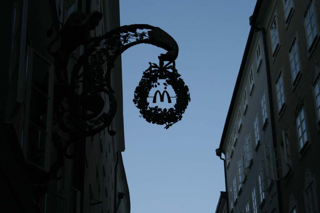 Getreidegasse's artistic signs make every stroll feel like walking through an outdoor museum.