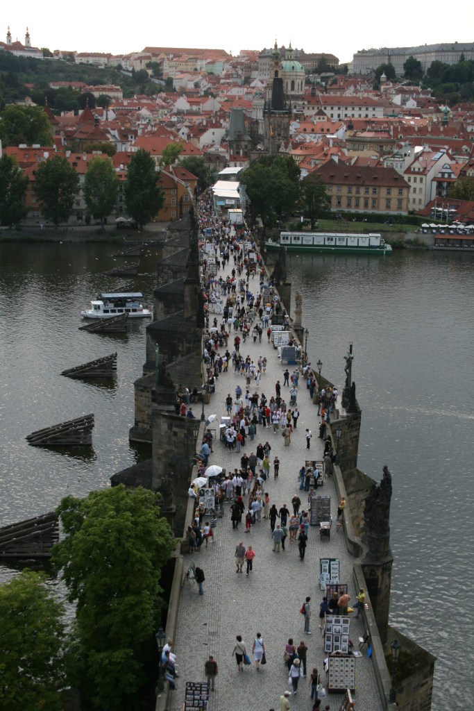 Experiencing the quiet, misty morning on the famous Charles Bridge.